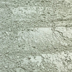 Close-Up of Micronized Greensand Powder – Fine glauconite powder packed with potassium, iron, and trace minerals.